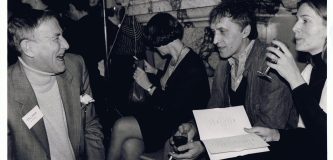 Attending laughing at an awards gala in the 1990s