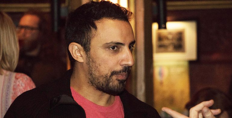 Young man deep in conversation