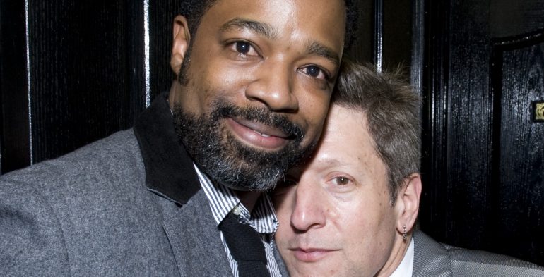 Photo of two men hugging