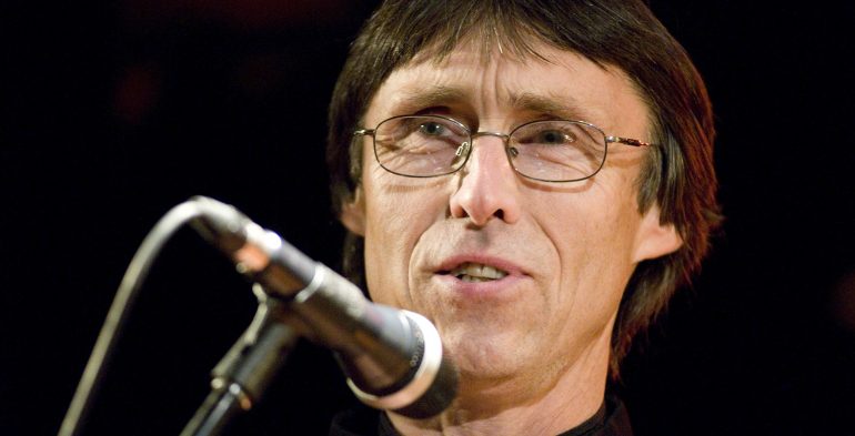 Man talking to a microphone