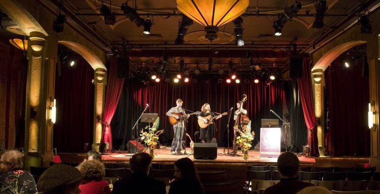 Upright basis, and two guitar players on stage