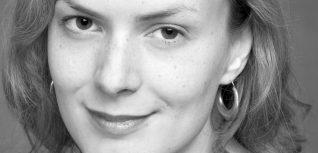Black and white photo of woman smiling