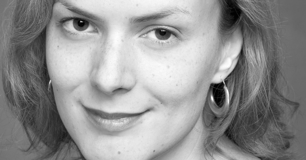 Black and white photo of woman smiling
